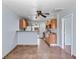 This kitchen features light wood cabinets, a breakfast bar, and ceramic tile flooring at 4000 Visby Ln, Las Vegas, NV 89119