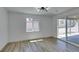 A bright bedroom offers natural light and patio access at 4255 Breezy Point Ln, Las Vegas, NV 89115