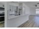 Kitchen with stylish gray cabinets, modern appliances, and a large island at 4255 Breezy Point Ln, Las Vegas, NV 89115