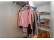 Walk-in closet includes shelves, a hanging rod and a wood floor at 508 Purcell Dr, Las Vegas, NV 89107