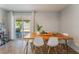 Dining room featuring table with fruit display and view to backyard at 508 Purcell Dr, Las Vegas, NV 89107