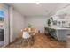 Bright dining area with modern chairs, table, and sliding door to patio at 508 Purcell Dr, Las Vegas, NV 89107