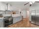 Modern kitchen with stainless steel appliances, granite countertops, and easy access to living spaces at 508 Purcell Dr, Las Vegas, NV 89107