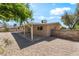 The backyard features a covered carport and lots of space at 5245 Hillman Ave, Las Vegas, NV 89142