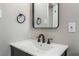 Close-up of updated sink featuring black faucet and hardware at 5245 Hillman Ave, Las Vegas, NV 89142