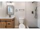 Bathroom features updated vanity, black hardware, and tile shower at 5245 Hillman Ave, Las Vegas, NV 89142
