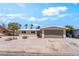 A charming single-story home offers an attached two-car garage at 5245 Hillman Ave, Las Vegas, NV 89142