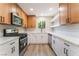 Modern kitchen featuring stainless steel appliances, stylish cabinets, and bright countertops at 5245 Hillman Ave, Las Vegas, NV 89142