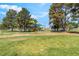 This large green space features a colorful playground structure at 5245 Hillman Ave, Las Vegas, NV 89142
