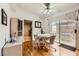 Bright dining area offers hardwood floors and a view of the patio at 5401 Bugle Way # 103, Las Vegas, NV 89108