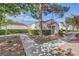 Charming single-story home with well-maintained landscaping and a cozy, inviting front yard at 5401 Bugle Way # 103, Las Vegas, NV 89108