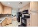 Practical kitchen equipped with matching appliances and ample countertop space at 5401 Bugle Way # 103, Las Vegas, NV 89108