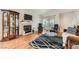 Comfortable living room has hardwood floors and a fireplace at 5401 Bugle Way # 103, Las Vegas, NV 89108