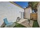 Enclosed patio offers a secure space for relaxation with a garden and comfortable seating area at 5401 Bugle Way # 103, Las Vegas, NV 89108