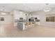 Gourmet kitchen featuring a large center island, stainless steel appliances, and modern lighting at 6056 Willow Rock St, Las Vegas, NV 89135