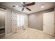 A cozy bedroom that has a window with white shutters, and a closet at 6417 Fisher Ave, Las Vegas, NV 89130