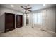 This bedroom features an open closet and window with white shutters at 6417 Fisher Ave, Las Vegas, NV 89130