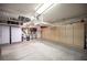 Spacious garage offering overhead racks, storage cabinets, and a clean, organized space at 6417 Fisher Ave, Las Vegas, NV 89130