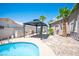 Outdoor living area with pool, gazebo, and landscaped backyard offers a private retreat at 6417 Fisher Ave, Las Vegas, NV 89130
