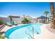 Inviting pool with lounge chairs and a gazebo in the backyard at 6417 Fisher Ave, Las Vegas, NV 89130