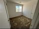 Bedroom featuring neutral carpet and a window at 7282 Quarterhorse Ln, Las Vegas, NV 89148