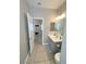 Bathroom featuring a vanity with a sink, mirror, and lighting at 8340 Winterchase Pl, Las Vegas, NV 89143