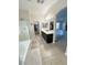 En-suite bathroom with dual sinks, shower, tub and walk-in closet at 8340 Winterchase Pl, Las Vegas, NV 89143