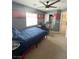 Bedroom with bed, desk, gaming chair, closet and baseball decorations on the wall at 8340 Winterchase Pl, Las Vegas, NV 89143