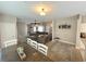 Spacious living room with plush seating, decorative rugs, and ceiling fan at 8340 Winterchase Pl, Las Vegas, NV 89143