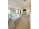 Large bedroom with carpet and ample space featuring a ceiling fan and light neutral paint at 8340 Winterchase Pl, Las Vegas, NV 89143