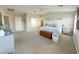Large main bedroom with carpet, vaulted ceiling, and ensuite bath, offering comfort and privacy at 8340 Winterchase Pl, Las Vegas, NV 89143