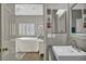 Bright bathroom featuring stylish square sink, decorative mirrors, and a doorway view into a bedroom at 8501 W University Ave # 1083, Las Vegas, NV 89147