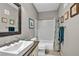 Clean bathroom features a soaking tub with shower, modern vessel sink, and stylish decor at 8501 W University Ave # 1083, Las Vegas, NV 89147