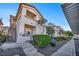 An apartment building boasts stairs, well-kept landscaping, and a fire extinguisher on-site at 8501 W University Ave # 1083, Las Vegas, NV 89147