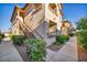 A charming apartment with inviting stair access, lush landscaping, and well-maintained exterior at 8501 W University Ave # 1083, Las Vegas, NV 89147