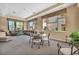 Spacious lounge area with comfortable seating, large windows, and stylish decor at 8501 W University Ave # 1083, Las Vegas, NV 89147