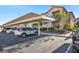 Assigned parking spot under a carport structure at a well-maintained apartment complex at 8501 W University Ave # 1083, Las Vegas, NV 89147