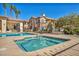 Resort-style community pool and hot tub with comfortable lounge seating at 8501 W University Ave # 1083, Las Vegas, NV 89147