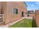 Fully fenced backyard with artificial turf and plenty of sunlight at 9021 Last Hope Ave, Las Vegas, NV 89178