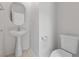 Compact half bathroom with modern sink and toilet at 9021 Last Hope Ave, Las Vegas, NV 89178