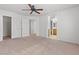 This spacious bedroom has carpeted floors and multiple doors leading to closet and bathroom at 9021 Last Hope Ave, Las Vegas, NV 89178