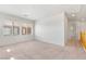 Spacious bedroom featuring carpeted floors and abundant natural light from large windows at 9021 Last Hope Ave, Las Vegas, NV 89178