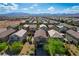 Stunning aerial view of a neighborhood with mountains in the distance at 9327 S Chieftain St, Las Vegas, NV 89178