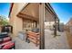 Inviting backyard with a covered patio, built-in BBQ, brick pavers and ample space for relaxing and entertaining at 9327 S Chieftain St, Las Vegas, NV 89178
