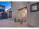 Cozy backyard patio with brick pavers and outdoor seating, perfect for relaxing at 9327 S Chieftain St, Las Vegas, NV 89178