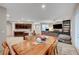 Open concept living space with a dining area and comfortable seating arrangement at 9327 S Chieftain St, Las Vegas, NV 89178