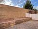 Spacious backyard with block wall at 9333 Leaping Deer Pl # 103, Las Vegas, NV 89178