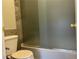 This bathroom features a toilet and shower with sliding door at 9333 Leaping Deer Pl # 103, Las Vegas, NV 89178
