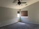 Bedroom featuring carpet flooring and natural light at 9333 Leaping Deer Pl # 103, Las Vegas, NV 89178