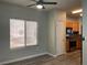 Open dining area with neutral walls, hardwood flooring and kitchen access at 9333 Leaping Deer Pl # 103, Las Vegas, NV 89178